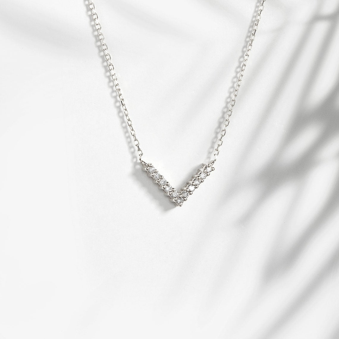 0.10 TCW Round Moissanite Diamond V Shaped Necklace - farrellouise