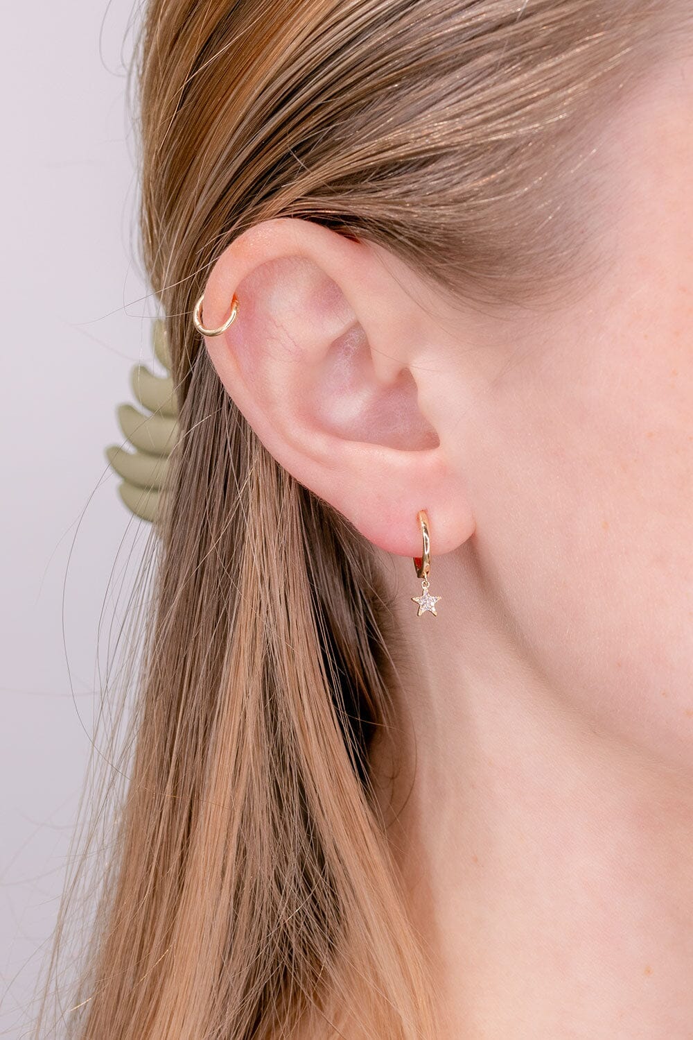 0.08 TCW Round Moissanite Star Huggies Earrings - farrellouise