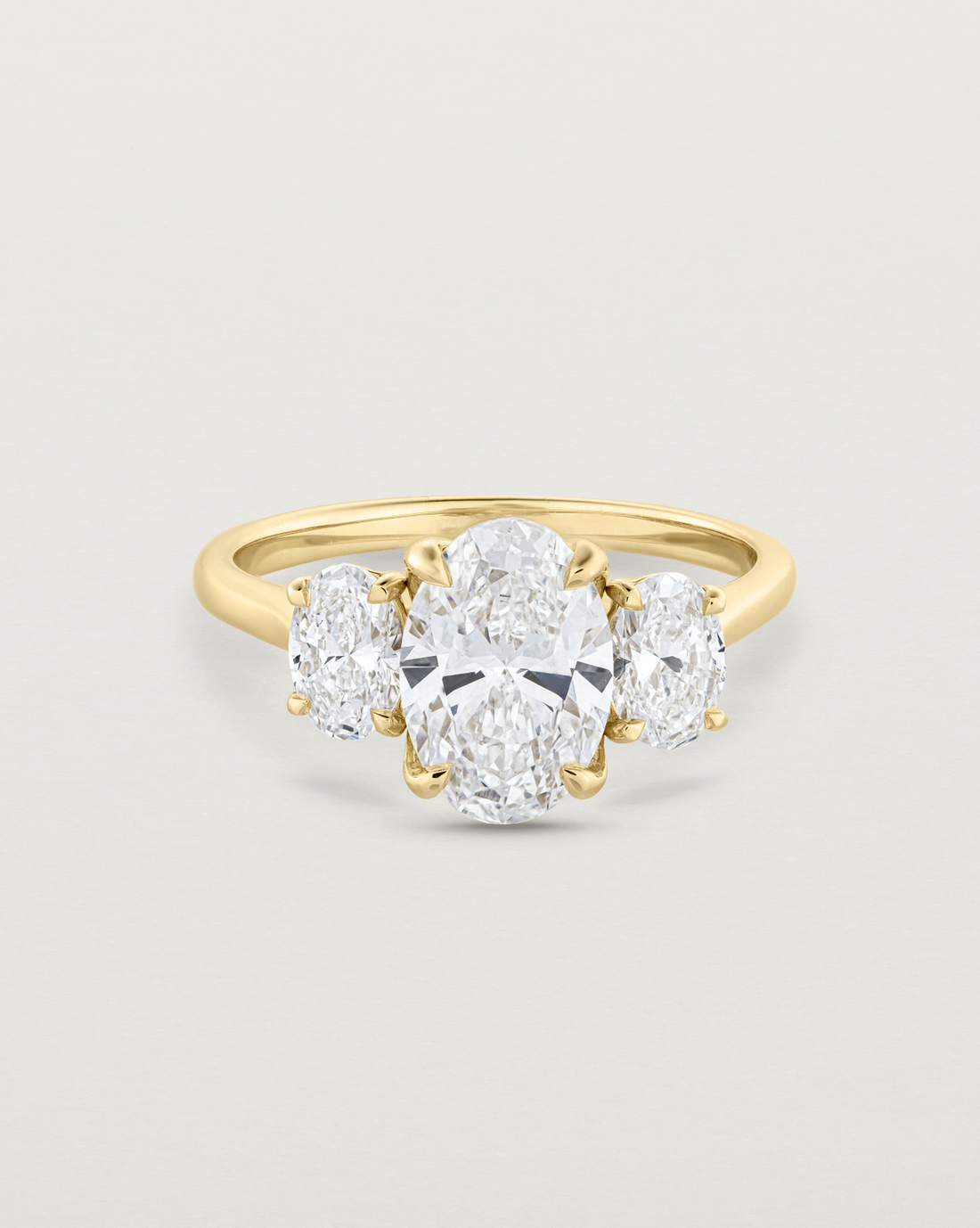 1_toni_1_5_ct_oval_cut_lab_diamond_three_stone_engagement_ring_1