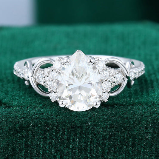 1.0 CT Pear Shaped Moissanite Cluster Engagement Ring - farrellouise