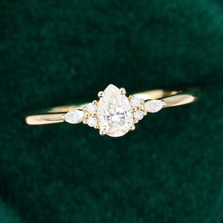 0.69 CT Pear Shaped Moissanite Cluster Engagement Ring - farrellouise