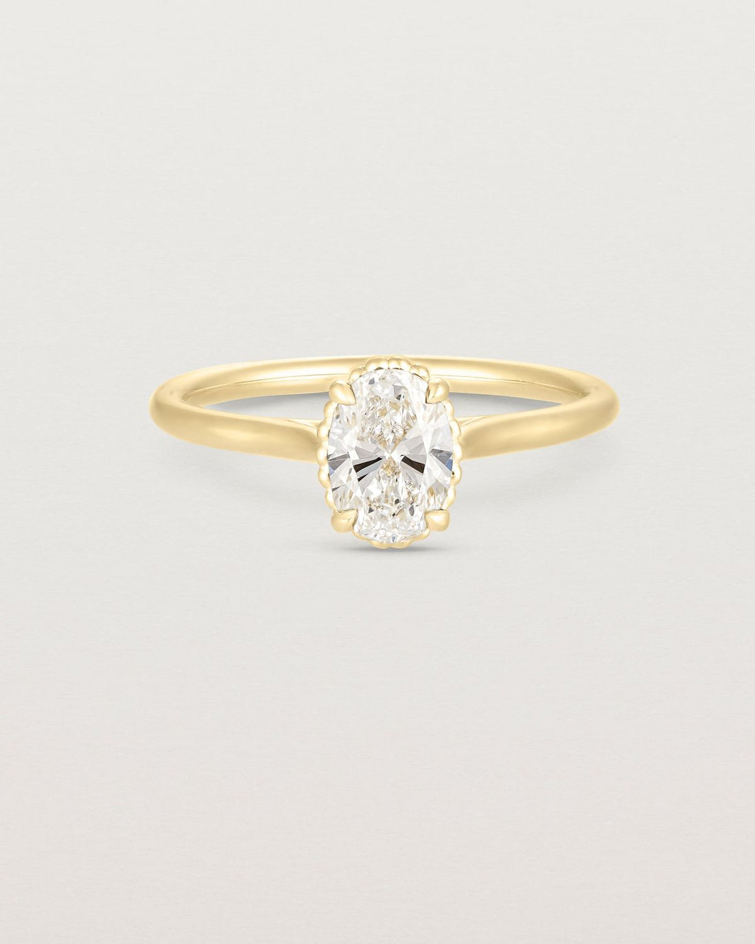 anne_oval_cut_lab_diamond_dotted_rail_solitaire_engagement_ring_1