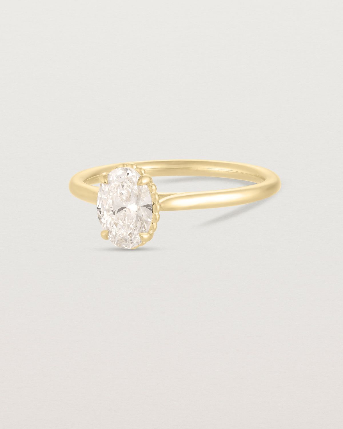 anne_oval_cut_lab_diamond_dotted_rail_solitaire_engagement_ring_3
