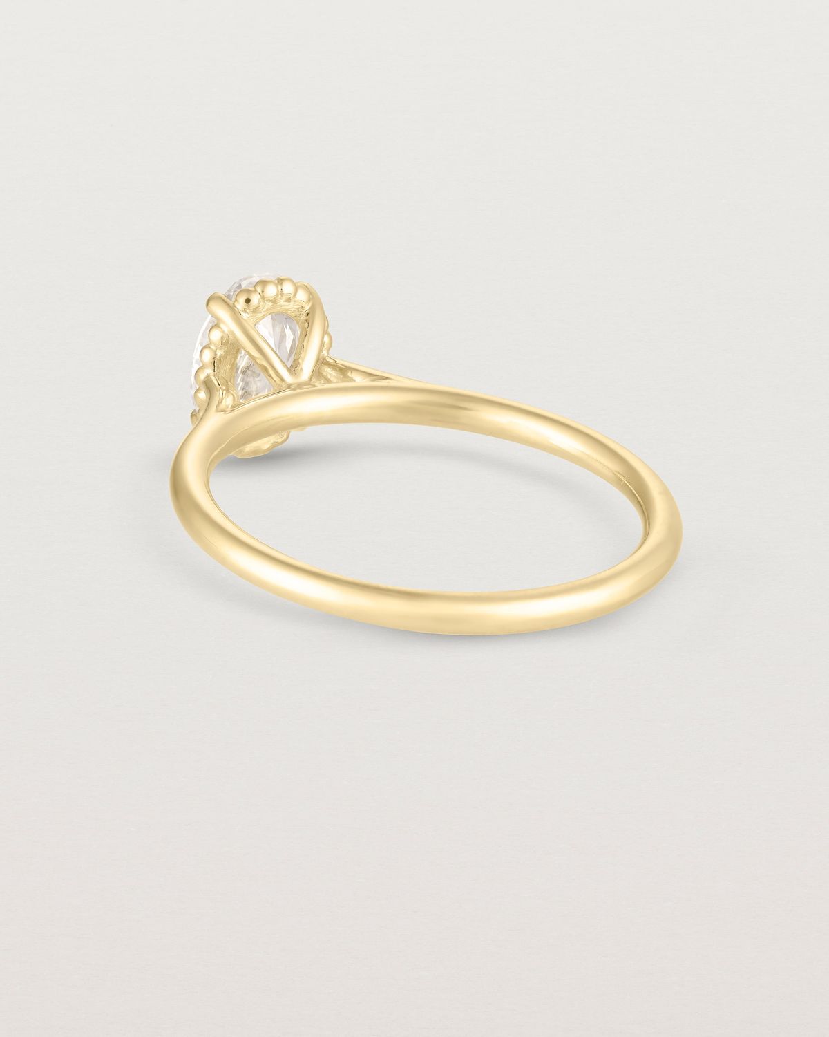 anne_oval_cut_lab_diamond_dotted_rail_solitaire_engagement_ring_4