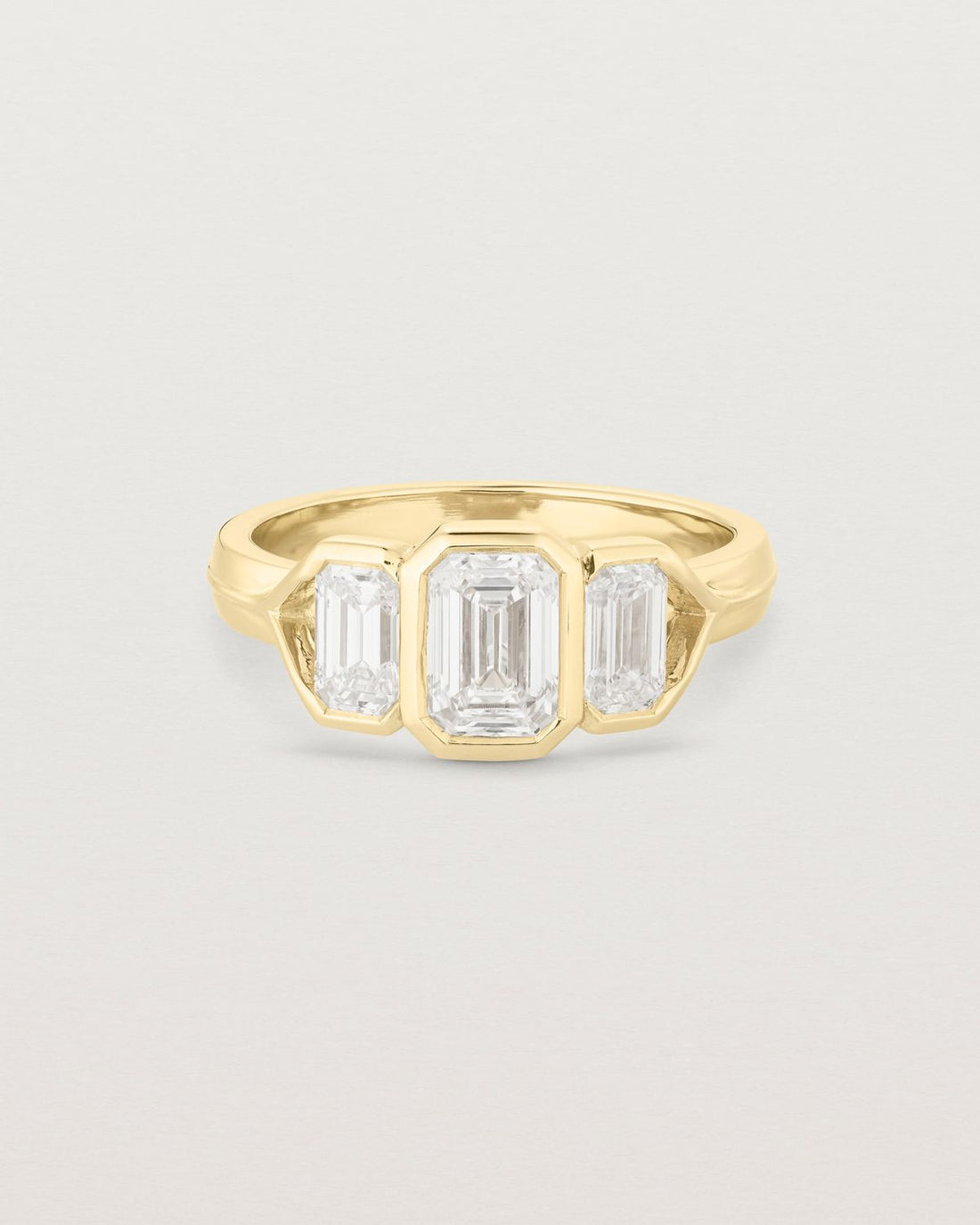 annie_0_82_ct_emerald_cut_lab_diamond_trio_engagement_ring_1