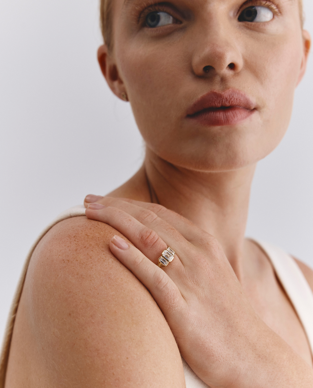 annie_0_82_ct_emerald_cut_lab_diamond_trio_engagement_ring_1