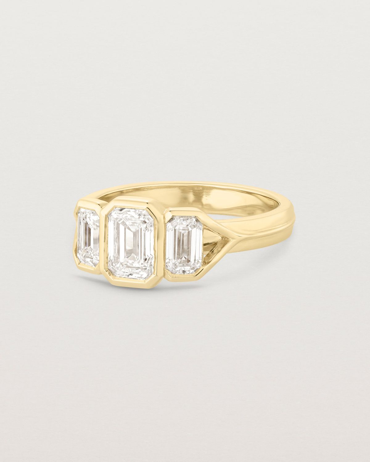 annie_0_82_ct_emerald_cut_lab_diamond_trio_engagement_ring_3