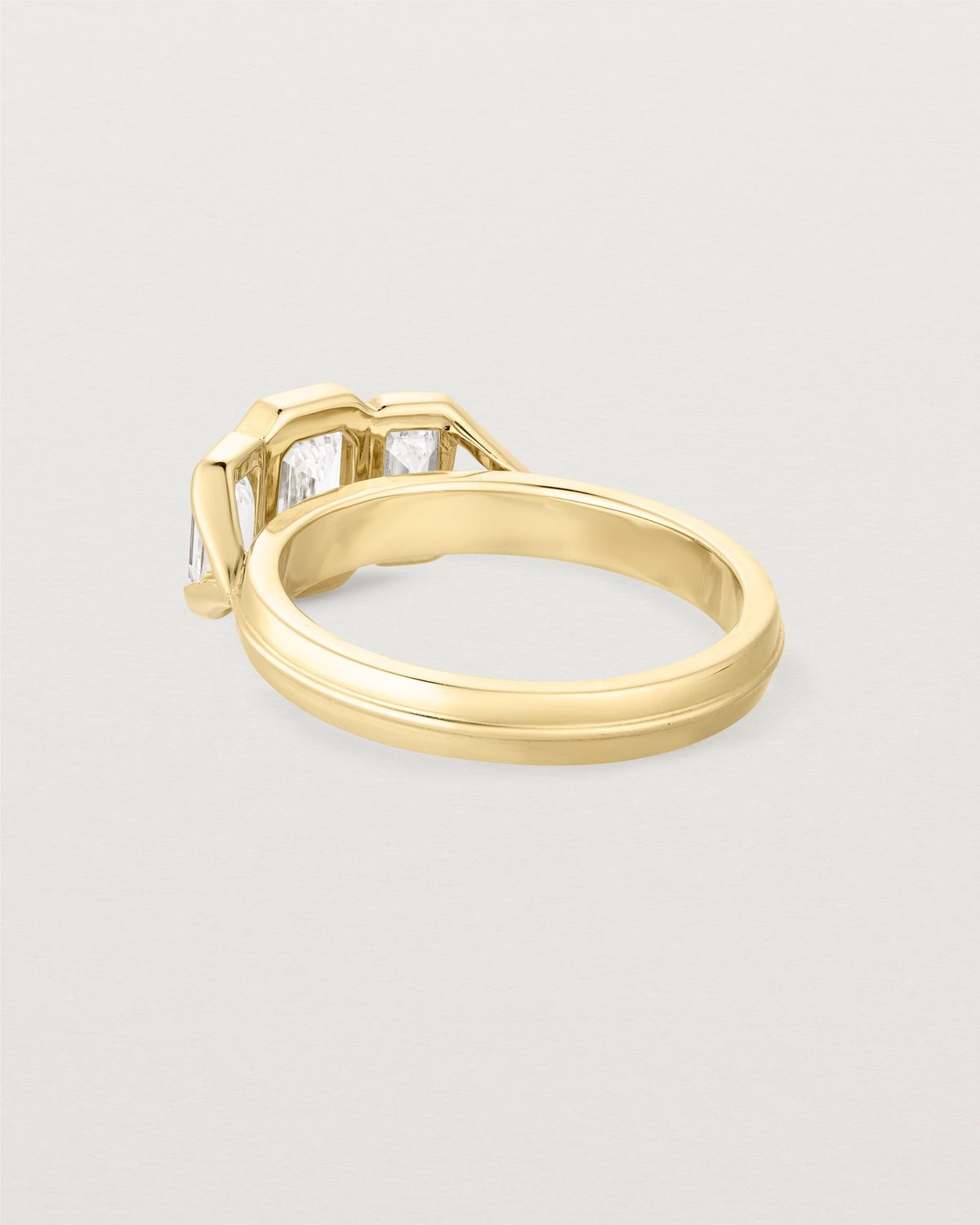 annie_0_82_ct_emerald_cut_lab_diamond_trio_engagement_ring_4