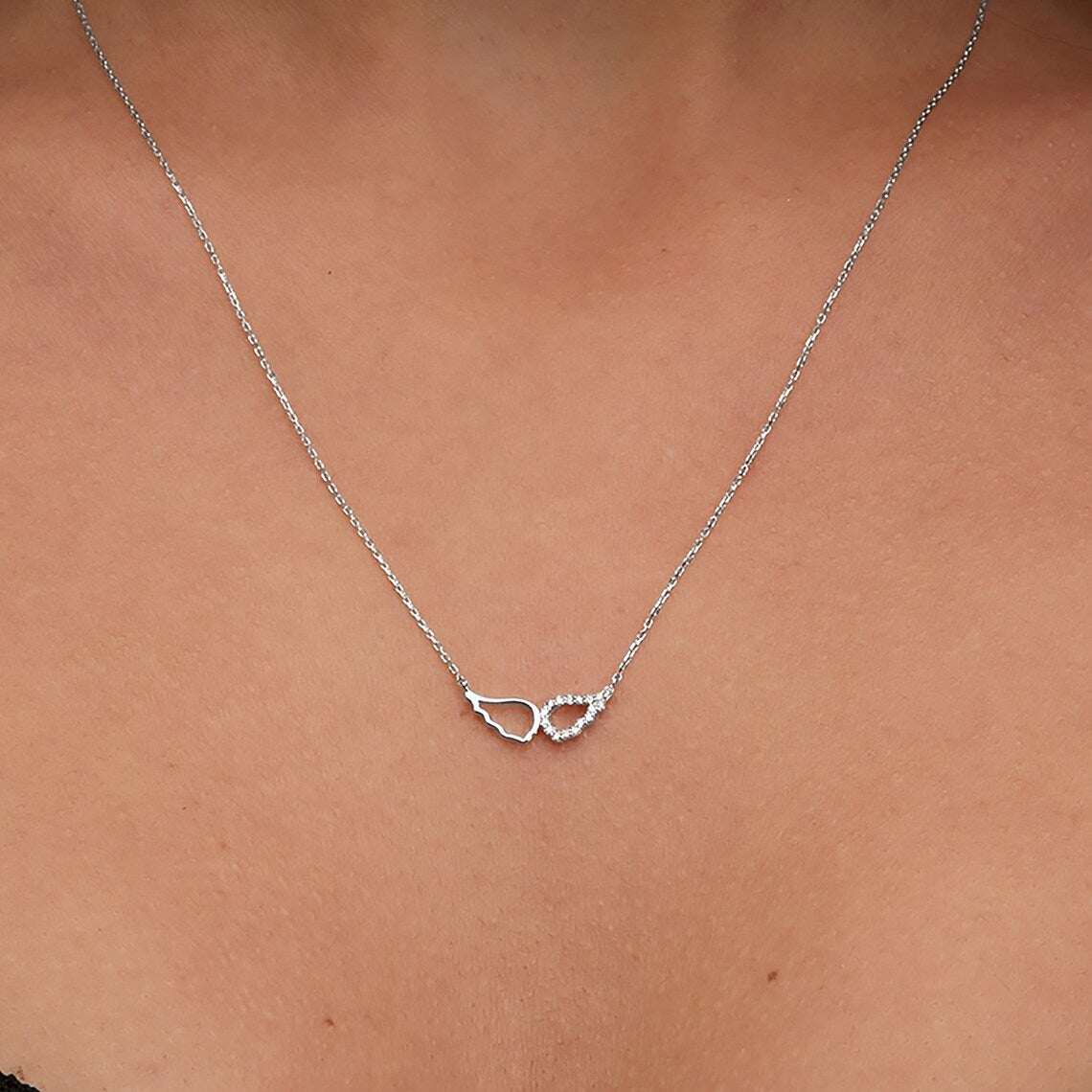 0.10 TCW Round Moissanite Diamond Wing Pendent Necklace - farrellouise