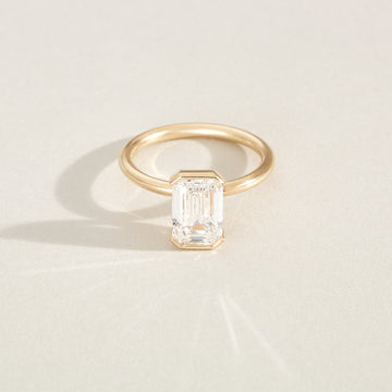 Kristin - Emerald Cut Lab Diamond Half Bezel Solitaire Engagement Ring