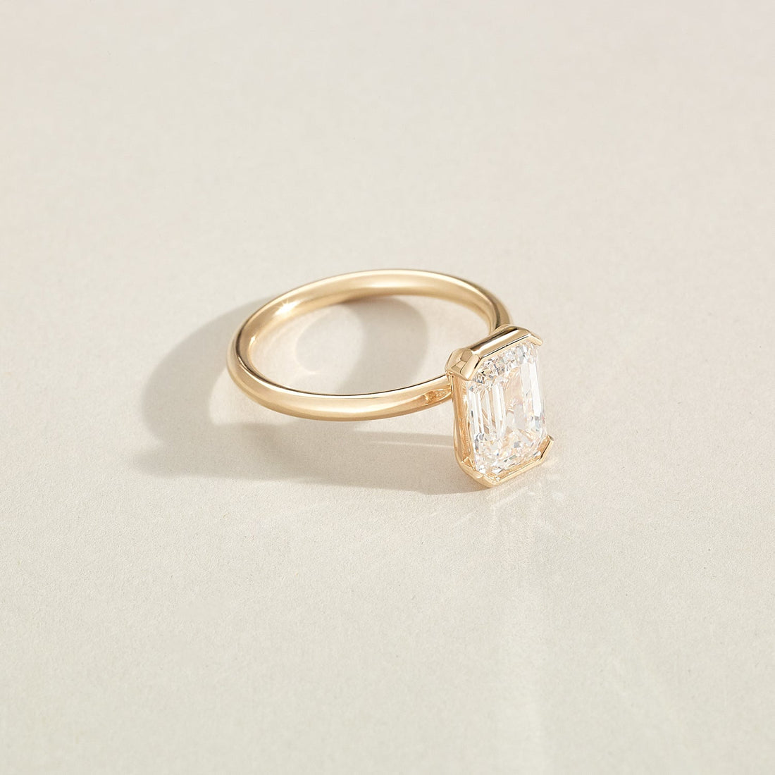 Kristin - Emerald Cut Lab Diamond Half Bezel Solitaire Engagement Ring