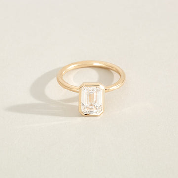 Lauren - Emerald Cut Lab Diamond Bezel Solitaire Engagement Ring
