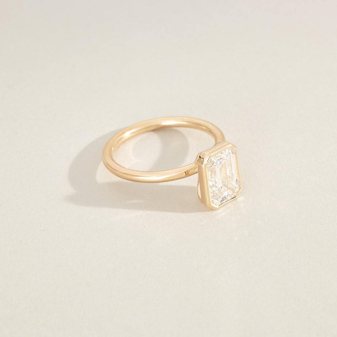 Lauren - Emerald Cut Lab Diamond Bezel Solitaire Engagement Ring