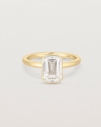 louisa_emerald_cut_lab_diamond_bezel_solitaire_engagement_ring_1
