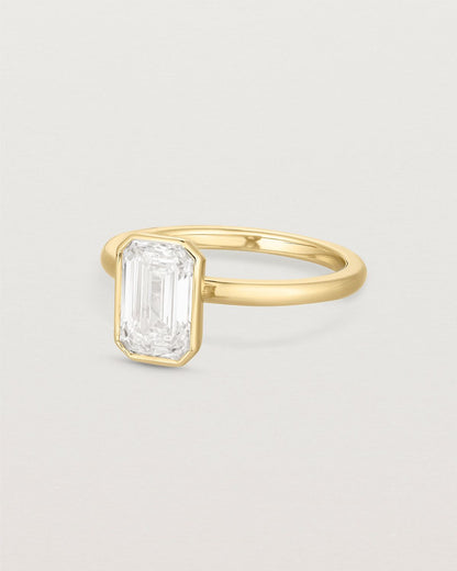 louisa_emerald_cut_lab_diamond_bezel_solitaire_engagement_ring_4