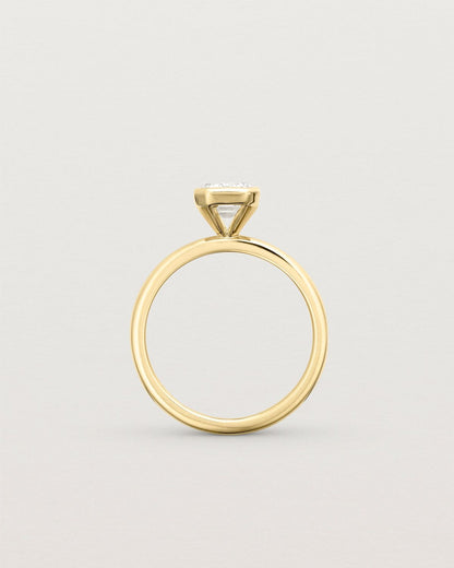 louisa_emerald_cut_lab_diamond_bezel_solitaire_engagement_ring_7