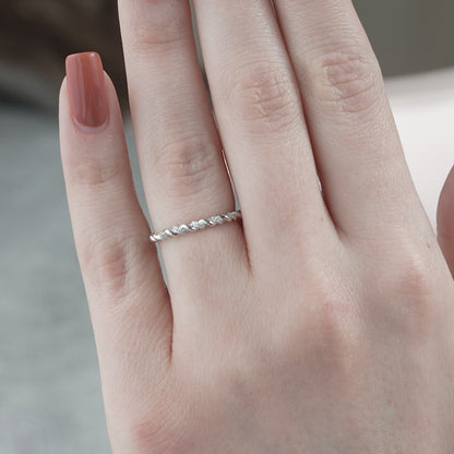 0.05 TCW Round Moissanite Twisted Wedding Band