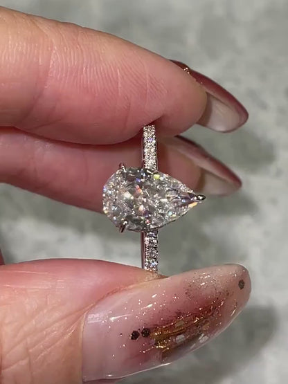 3.0 CT Pear Moissanite Hidden Halo Engagement Ring With Pave Setting
