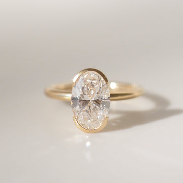 Rachelle - Oval Cut Lab Diamond Half Bezel Solitaire Engagement Ring