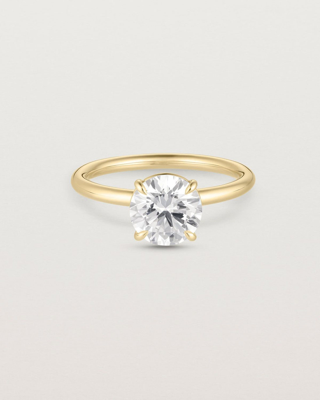 sylvia_round_cut_lab_diamond_tulip_solitaire_engagement_ring_1