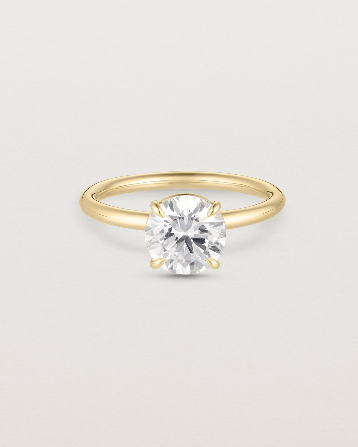 sylvia_round_cut_lab_diamond_tulip_solitaire_engagement_ring_1